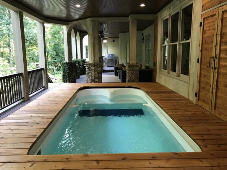 Triton residential pool wooden decking