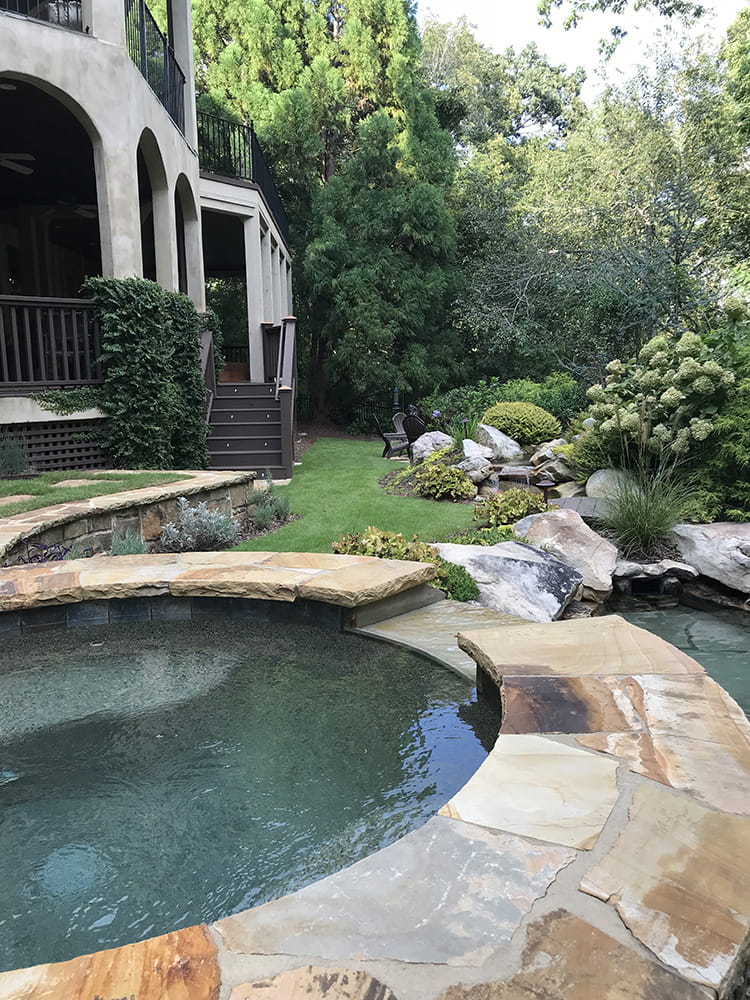 backyard pool water features