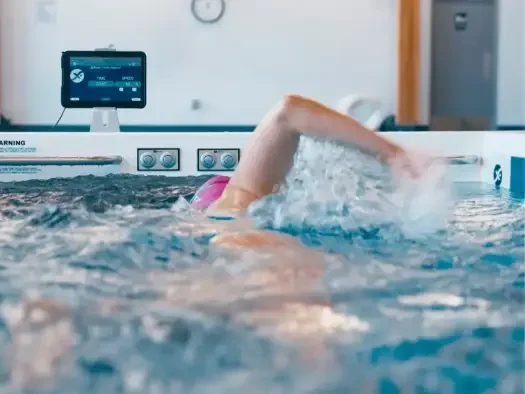 Swimmer doing laps in a SwimEx pool